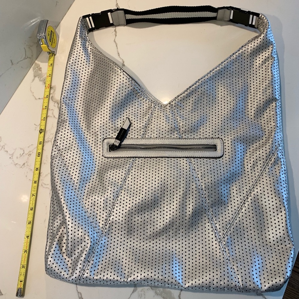 Metallic brushed silver Steve Madden bag never used.